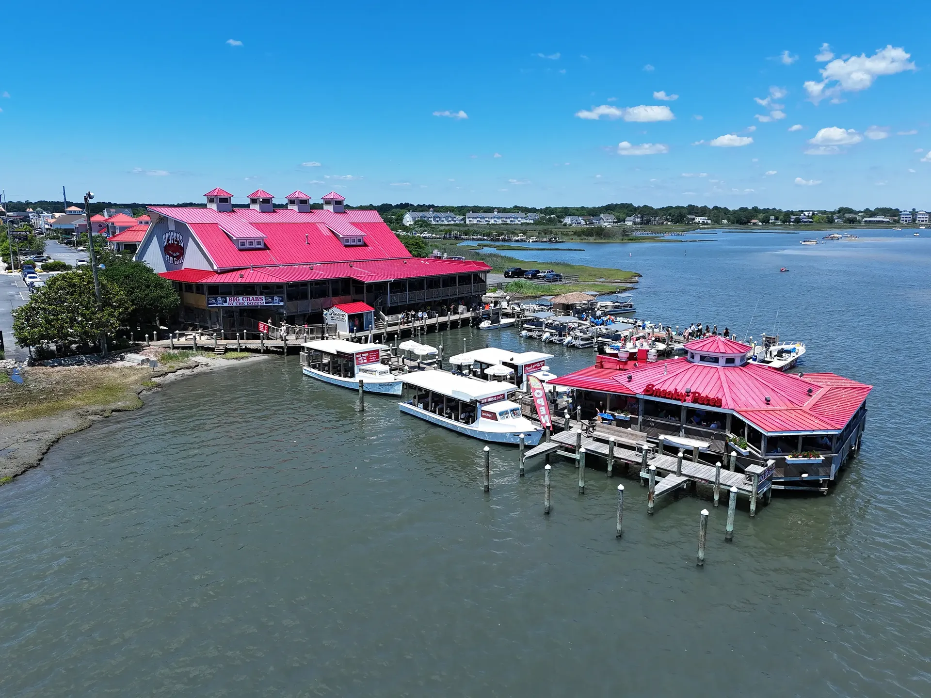 Aerial view of Hooper's Crab House and Sneaky Pete's on the water