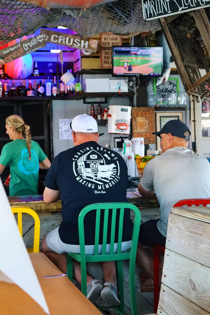 Guests enjoying the bar at Hooper's
