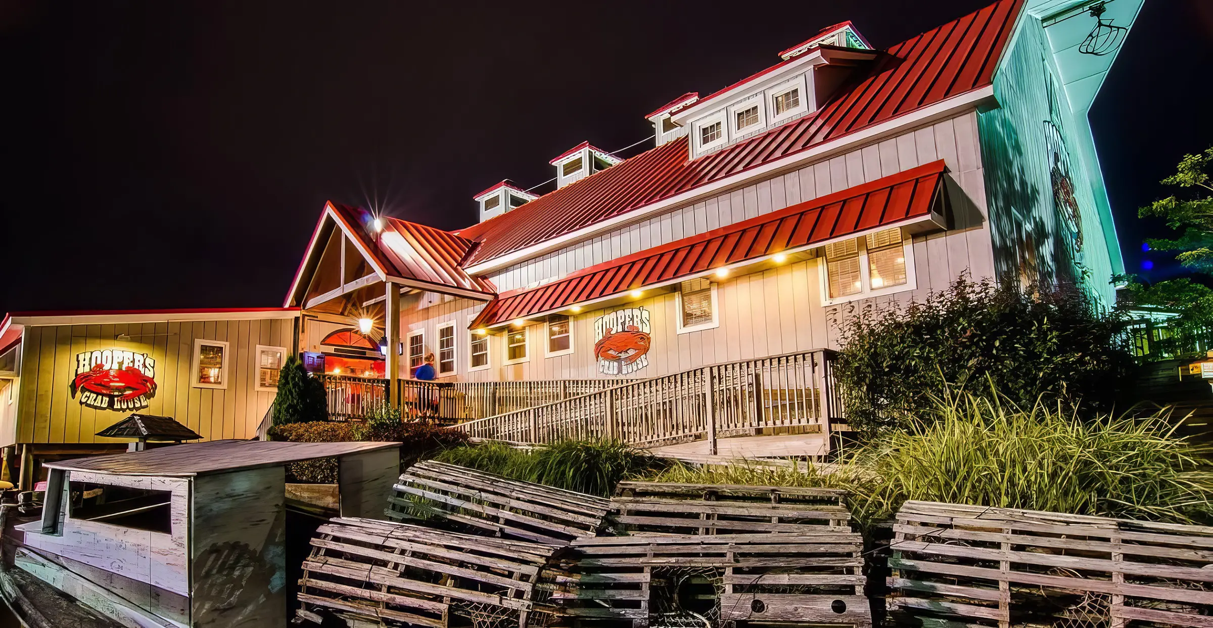 Hooper's Crab House lit up at night in West Ocean City