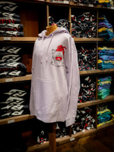 Front of hammered at Hoopers hoodie in pink